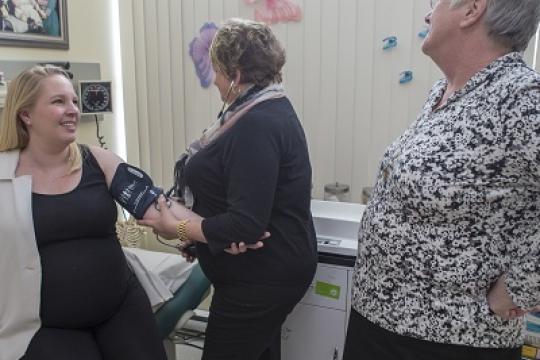 Blood pressure check by a family practice nurse